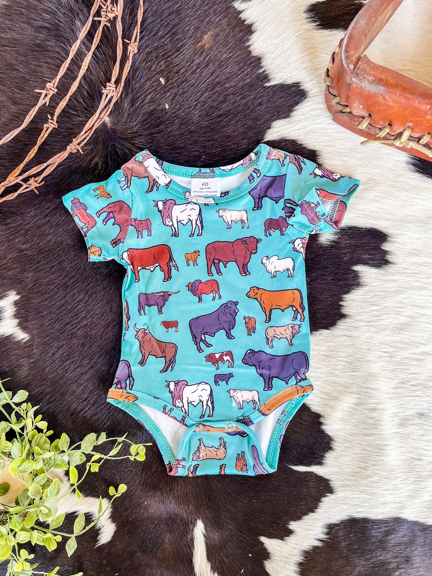 Turquoise Cow Onesie